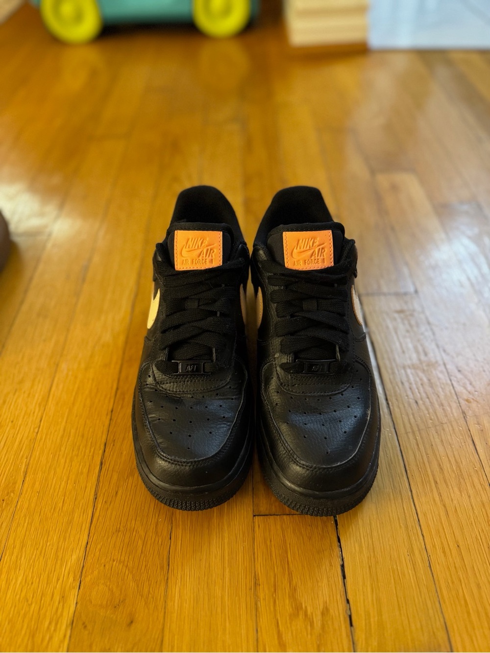 Nike Kids Black Sneakers with pink Tongue Accents